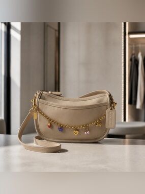 Vintage Coach Wendie Zip handbag in bone-tan color leather